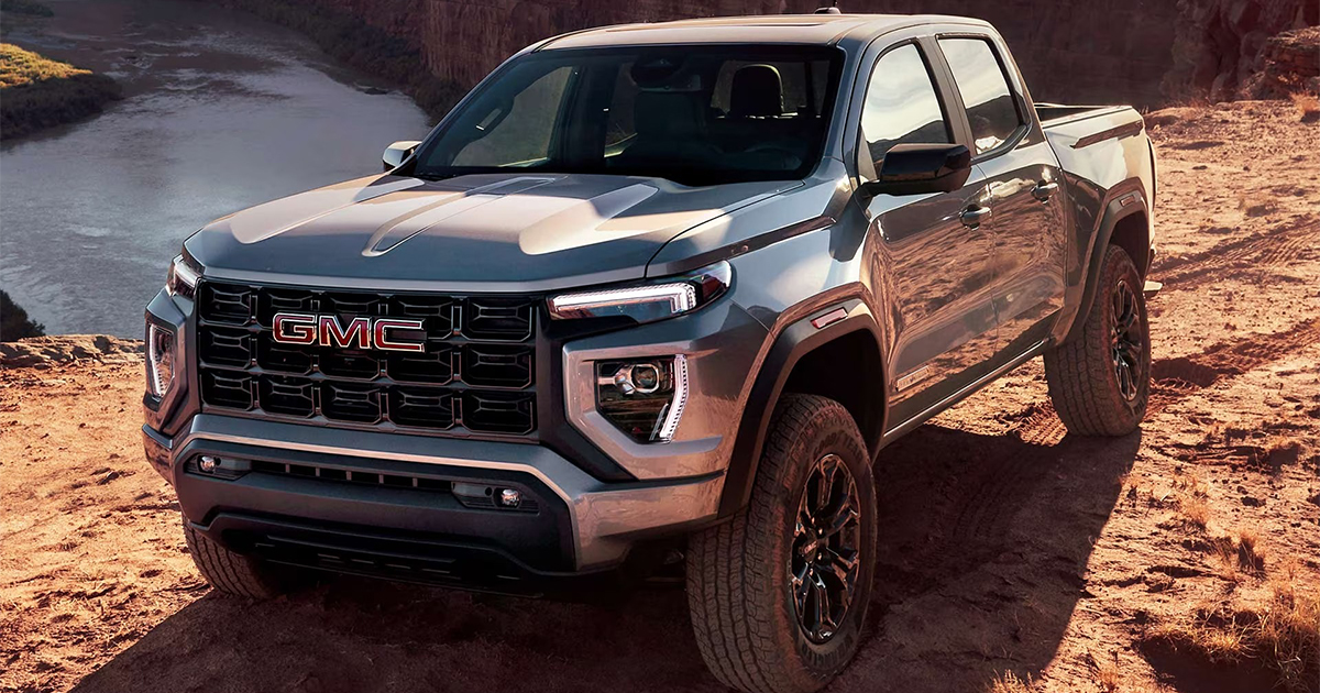 2025 GMC Canyon mid-size pickup truck in silver showcasing rugged capability and modern design